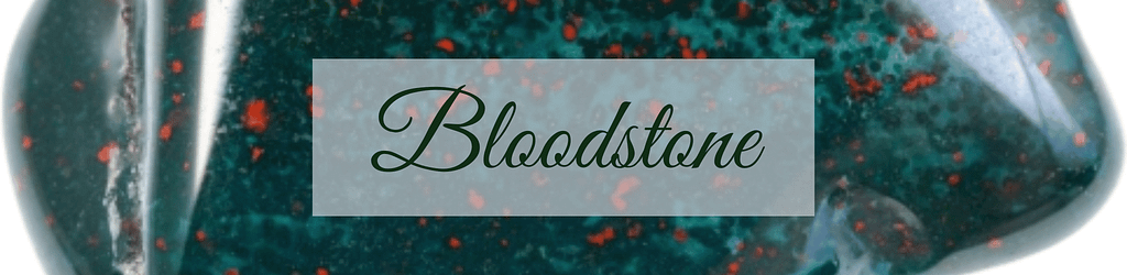 Green stone with red speckles overlaid with the word Bloodstone